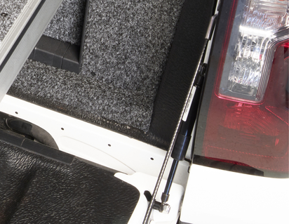 Pickup Attitude* Amortiguador para el portón del maletero con mecanismo de apertura controlada.