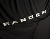 Safar* Premium skyddsöverdrag svart, med vit Ford-oval och Ranger emblem